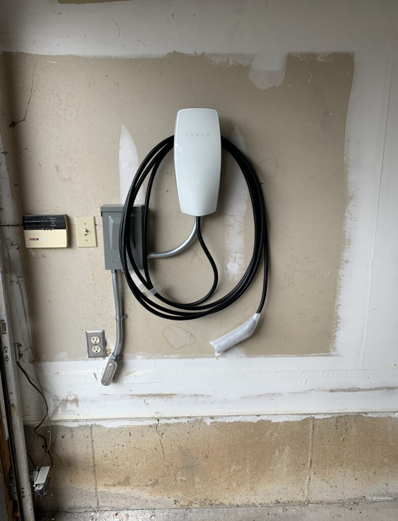 Licensed electrician installing EV home charger in East Credit, Mississauga
